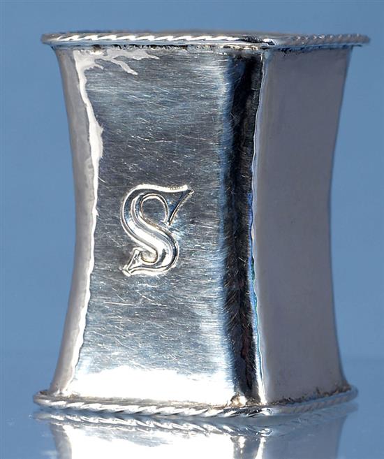 A George V Arts & Crafts planished silver waisted napkin ring, by Omar Ramsden, Height 60mm weight 1.3oz/42grms